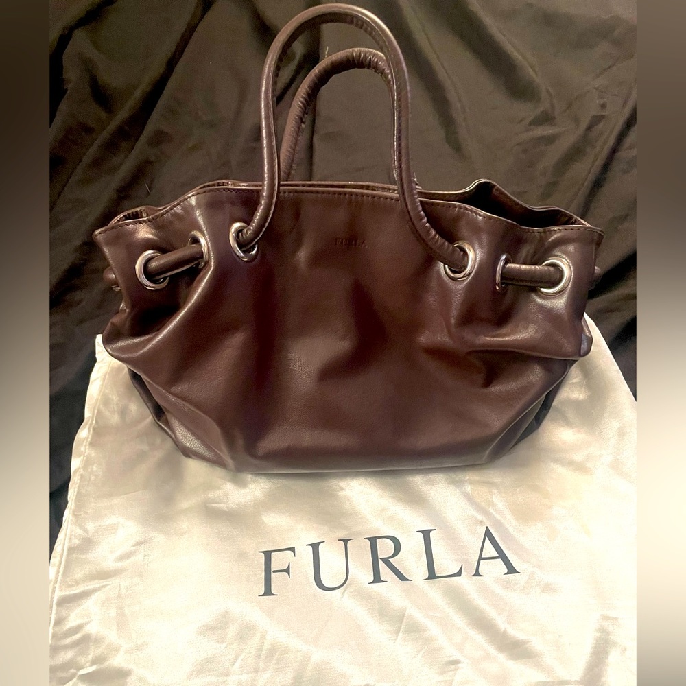 FURLA brand brown leather purse.